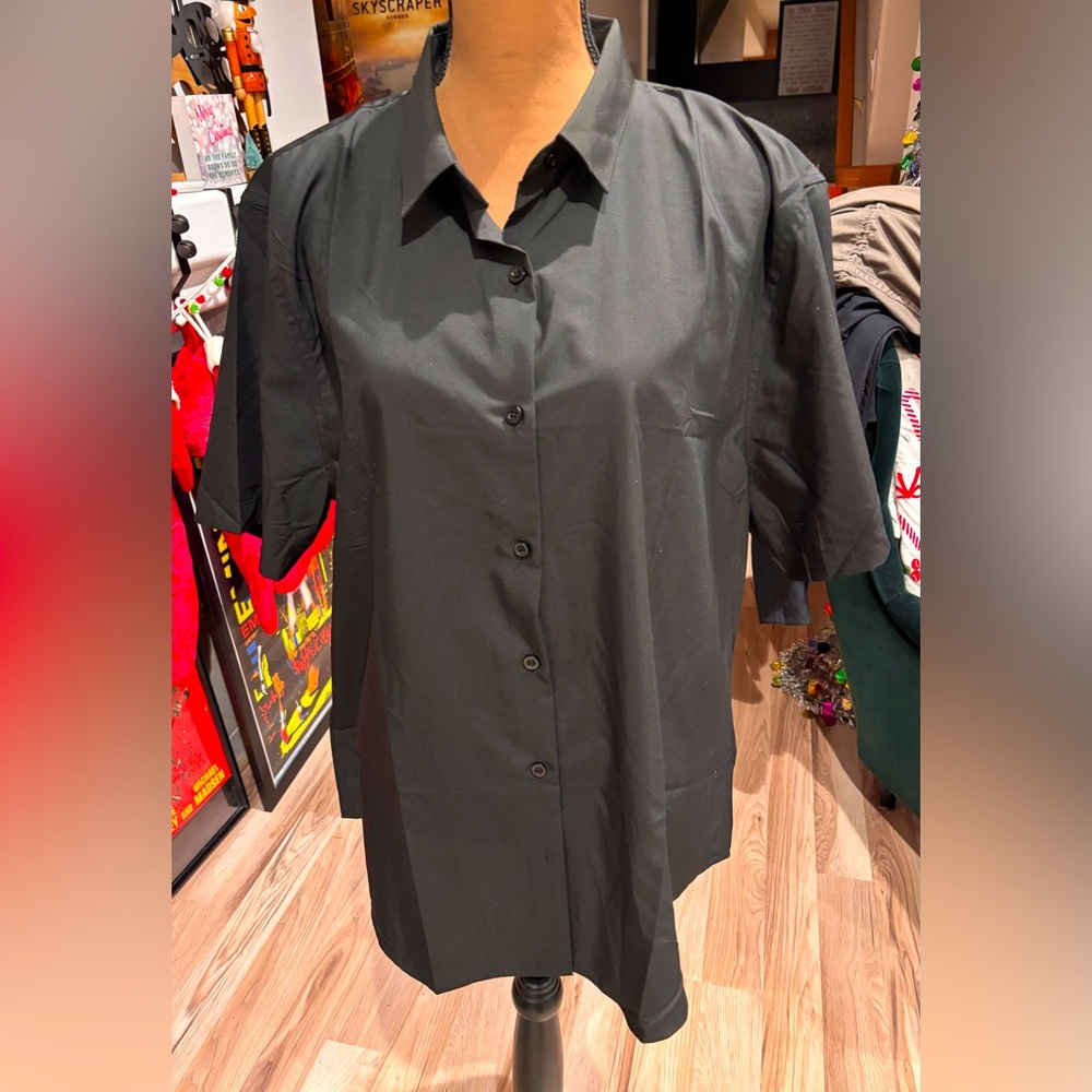 Simple black men’s shirt only worn once 2XL—dress it up
or dress it ups it down!